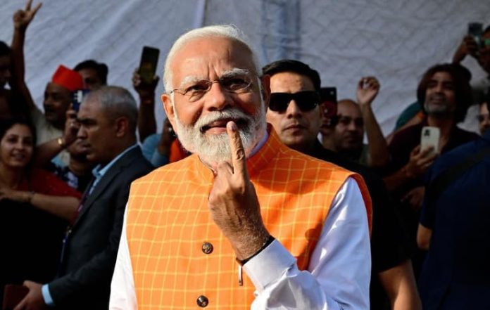PM Modi Casts Vote in Ahmedabad, Draws Large Crowd